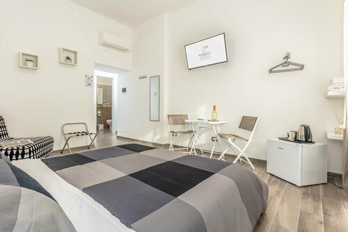 Гостиница Scirocco Rooms в Чивитавеккье