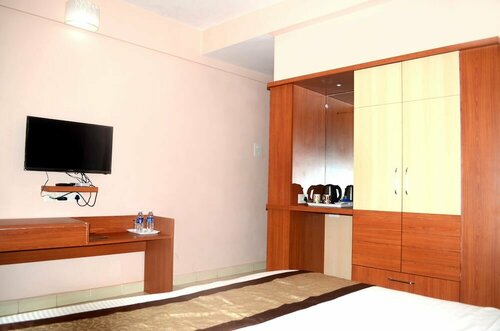 Гостиница Carina Beach Resort в Бенаулиме