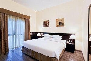 отель Ramada Hotel & Suites by Wyndham Ajman