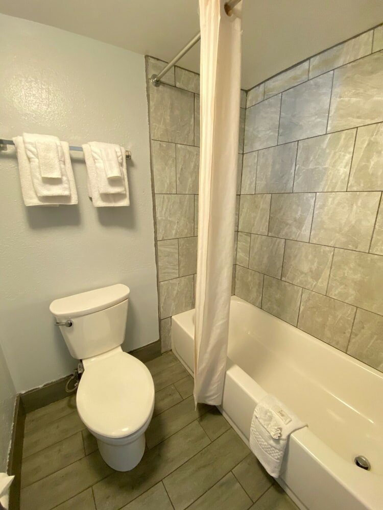 Фото Quarters Inn & Suites