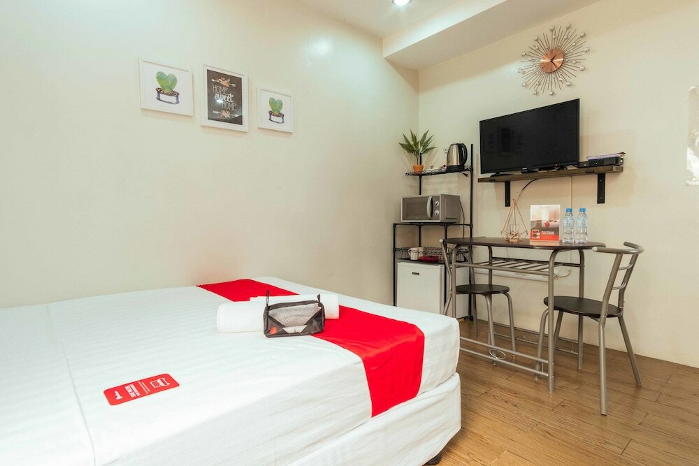 Фото Oyo 443 Maria Cristina Arcade Suites