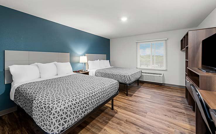 Фото Woodspring Suites Kansas City Airport