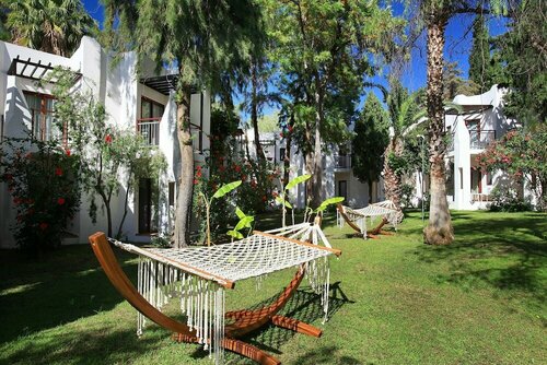 Гостиница DoubleTree by Hilton Bodrum Isil Club All-Inclusive Resort в Бодруме