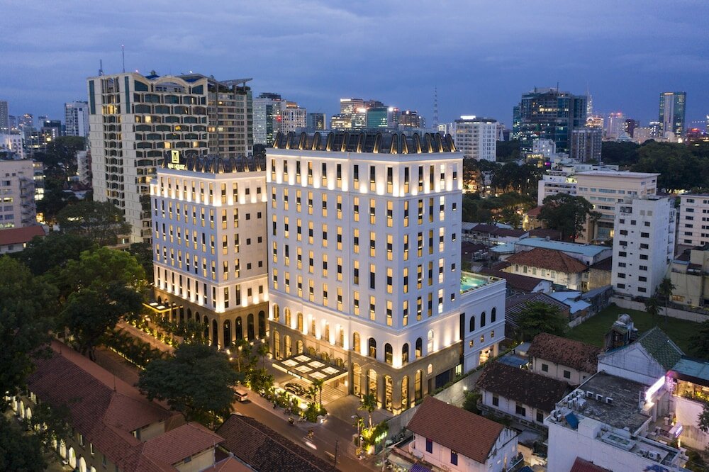 Фото Mai House Saigon Hotel