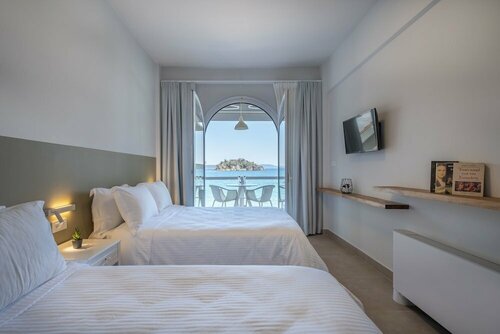 Внешний вид отеля Nelly’s Hotel & Apartments в Муниципальной единице Асинисе, фото 3