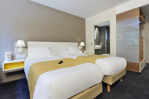 Гостиница Kyriad Prestige Pau - Zénith - Palais des Sports в По