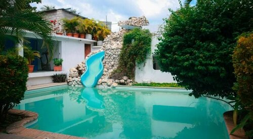 Гостиница Hotel Casa Flores De Tikal во Флоресе