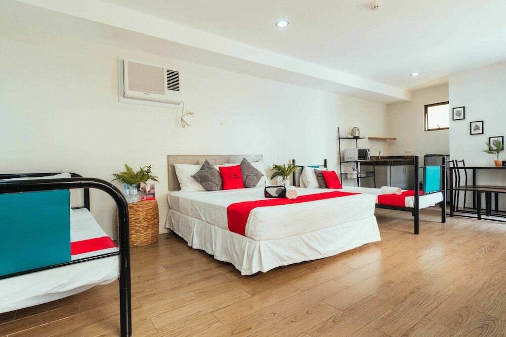 Фото Oyo 443 Maria Cristina Arcade Suites