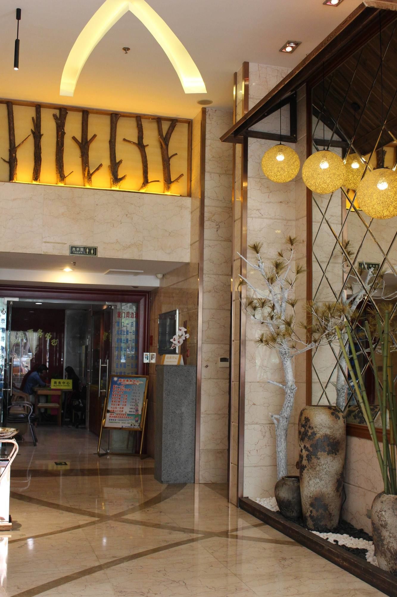 Фото Xiamen Hooray Hotel