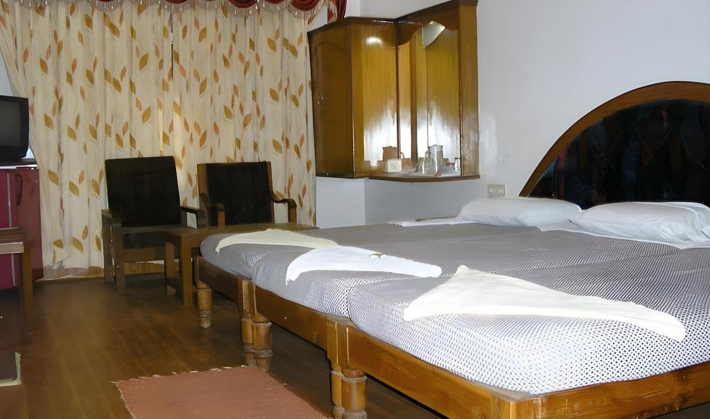 Фото Iroomz Shanbhag Towers International