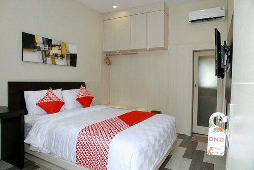 Гостиница Oyo 1656 Parama Su Hotel в Палу
