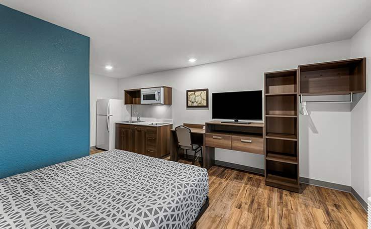Фото Woodspring Suites Kansas City Airport