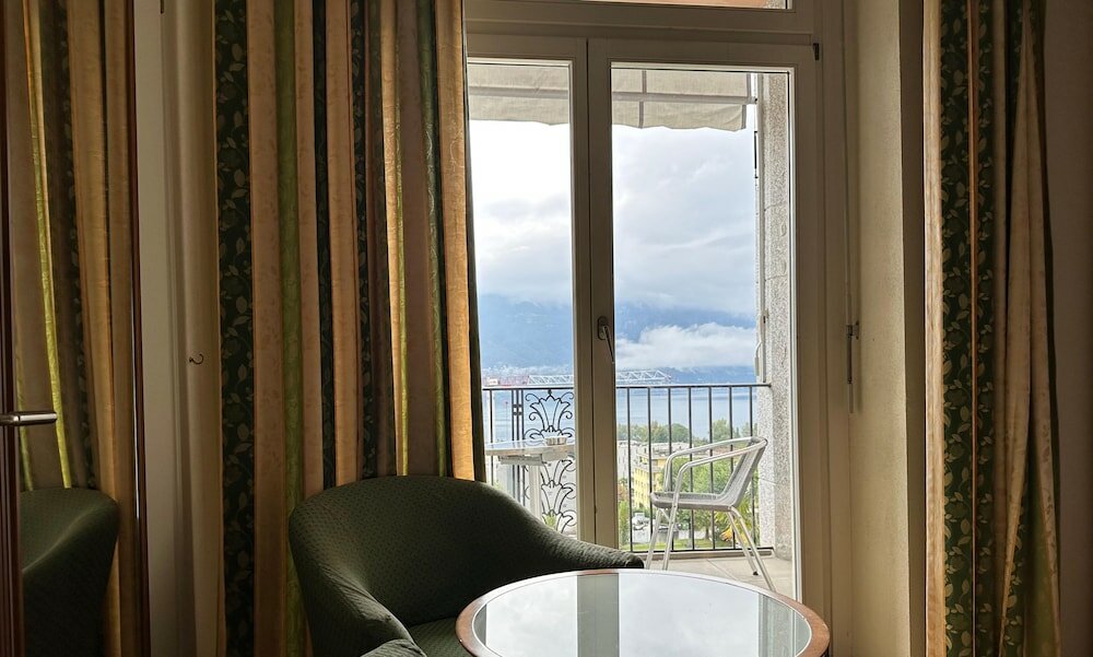 Фото E-Rooms Minusio