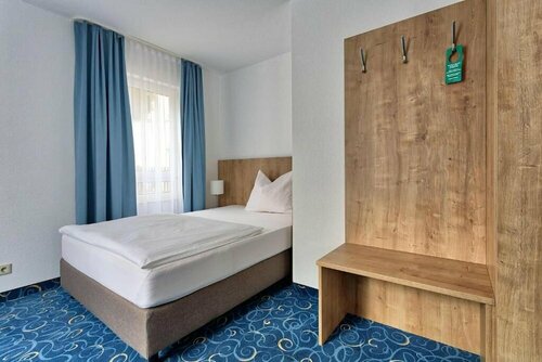 Гостиница Hotel am Stadtpark в Зиндельфингене