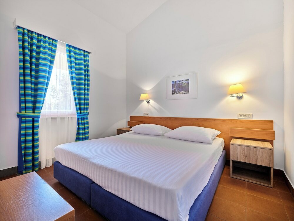 Фото Maistra Select Koversada Naturist Apartments