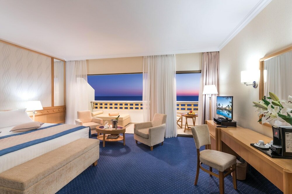 Фото Constantinou Bros Athena Royal Beach Hotel