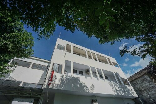 Гостиница Oyo 2566 Putri Kesia Rooms в Манадо