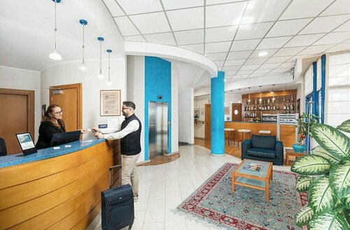 Гостиница Welcome Hotel Legnano в Леньяно