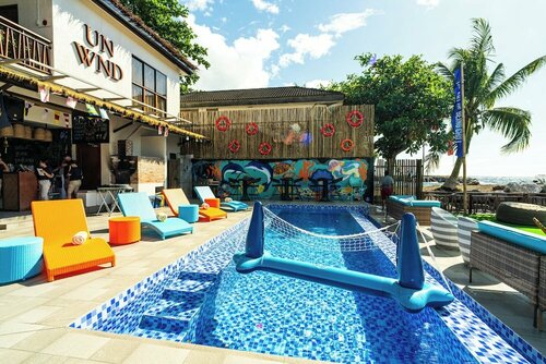 Гостиница Unwnd Boutique Hotel Camiguin в Провинции Камигин