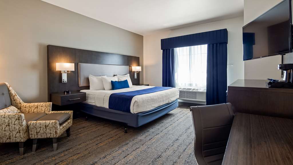 Фото Best Western Plus Roland Inn & Suites