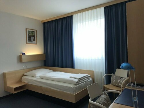Гостиница Comfort Hotel Atlantic Muenchen Sued в Оттобрунне