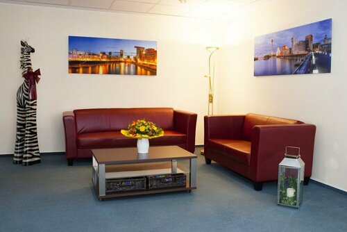 Гостиница Hotel am Düsseldorf Platz в Ратингене