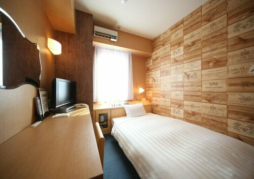 Гостиница Hotel Wing International Chitose в Титосэ