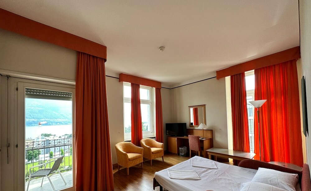 Фото E-Rooms Minusio