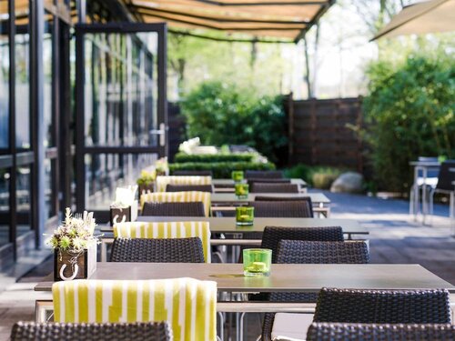 Внешний вид отеля Novotel Nuernberg Messezentrum в Нюрнберге, фото 3