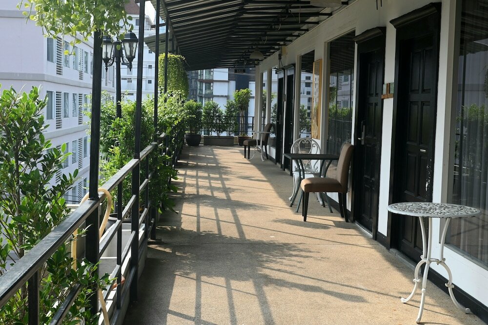 Фото Boss Suites Nana Hotel