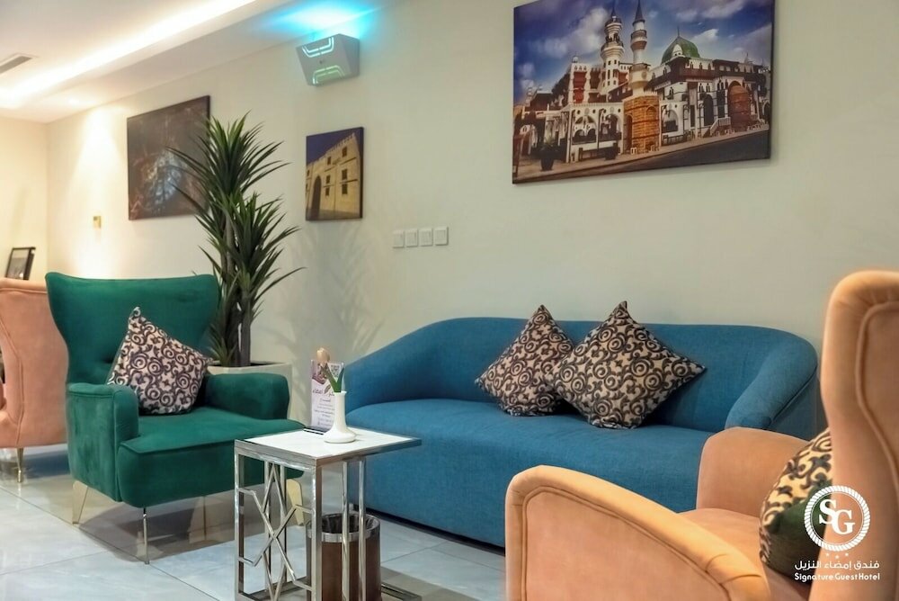 Фото Signature Guest Hotel