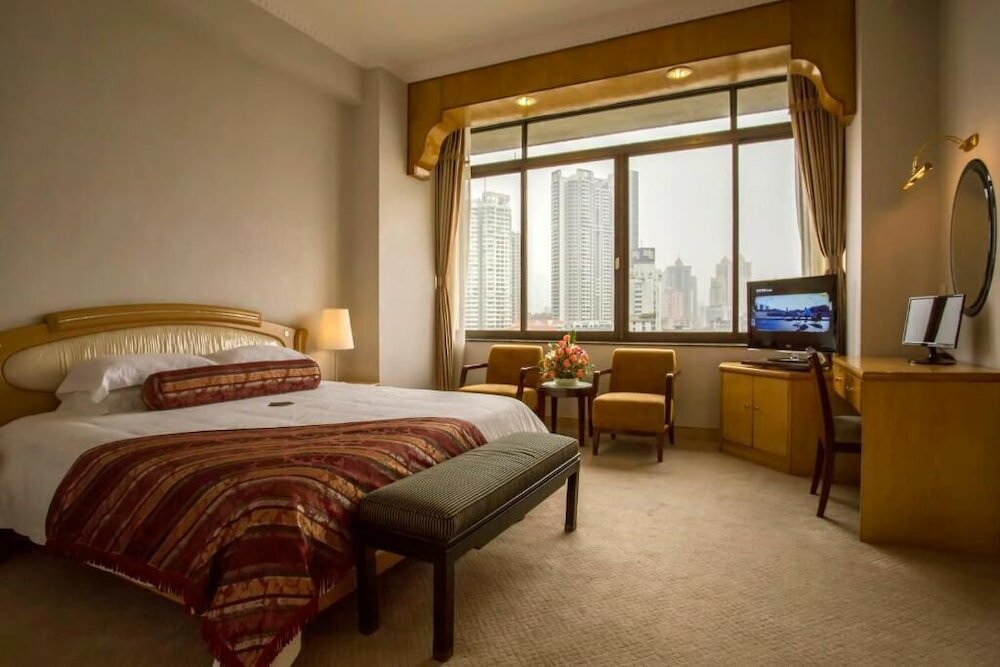 Фото Guangzhou Aiqun Hotel