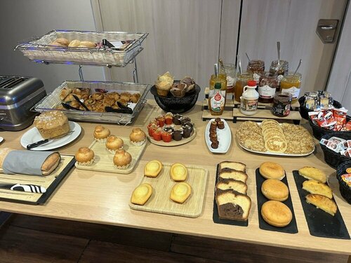 Гостиница Kyriad Prestige Pau - Zénith - Palais des Sports в По