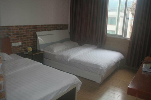 Гостиница Yaxiya Business Hotel в Дэяне