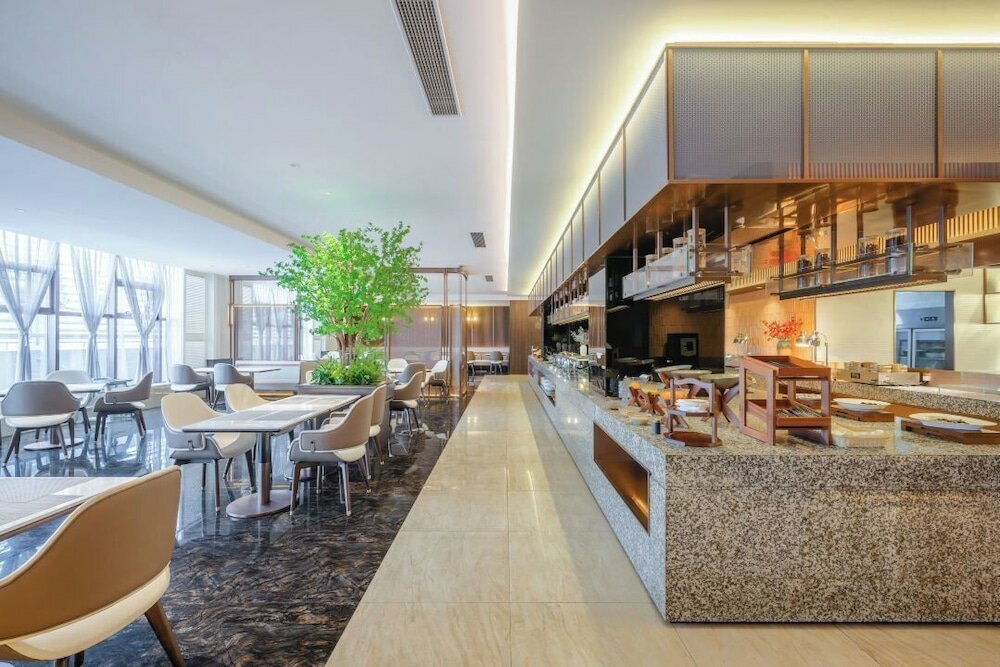 Фото Shanghai Maixinge International Hotel