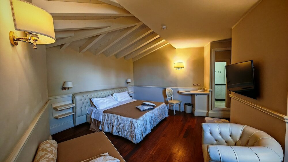 Фото Suite Hotel Santa Chiara