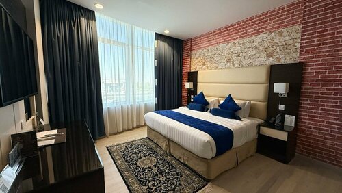 Гостиница Holiday Villa Hail Hotel فندق هوليداي فيلا حائل в Хаиле