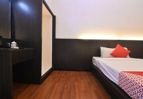 Гостиница Oyo 43960 Laksamana Executive & Boutique Hotel в Тавау