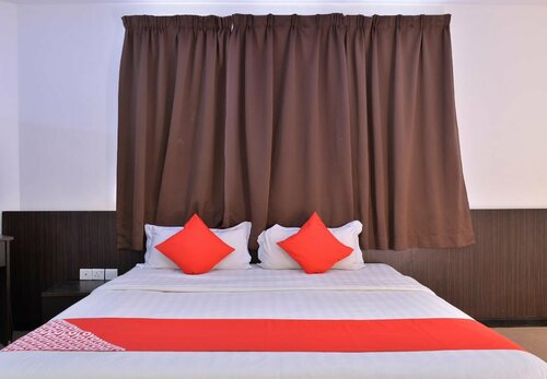 Гостиница Oyo 43960 Laksamana Executive & Boutique Hotel в Тавау