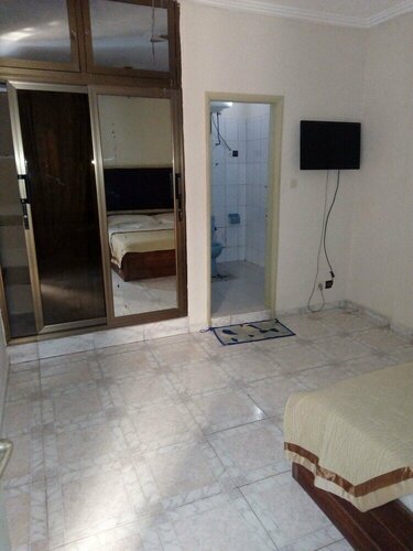 Гостиница Stone Hotel в Ломе