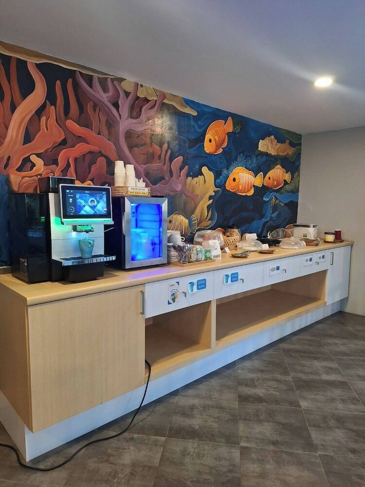 Фото Atom Phuket Hotel