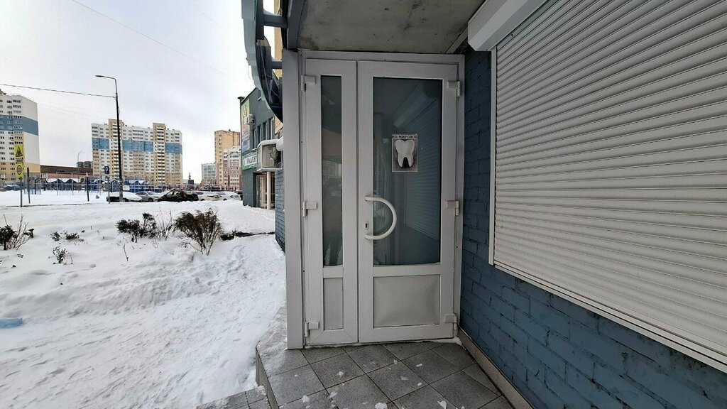 Стоматолог