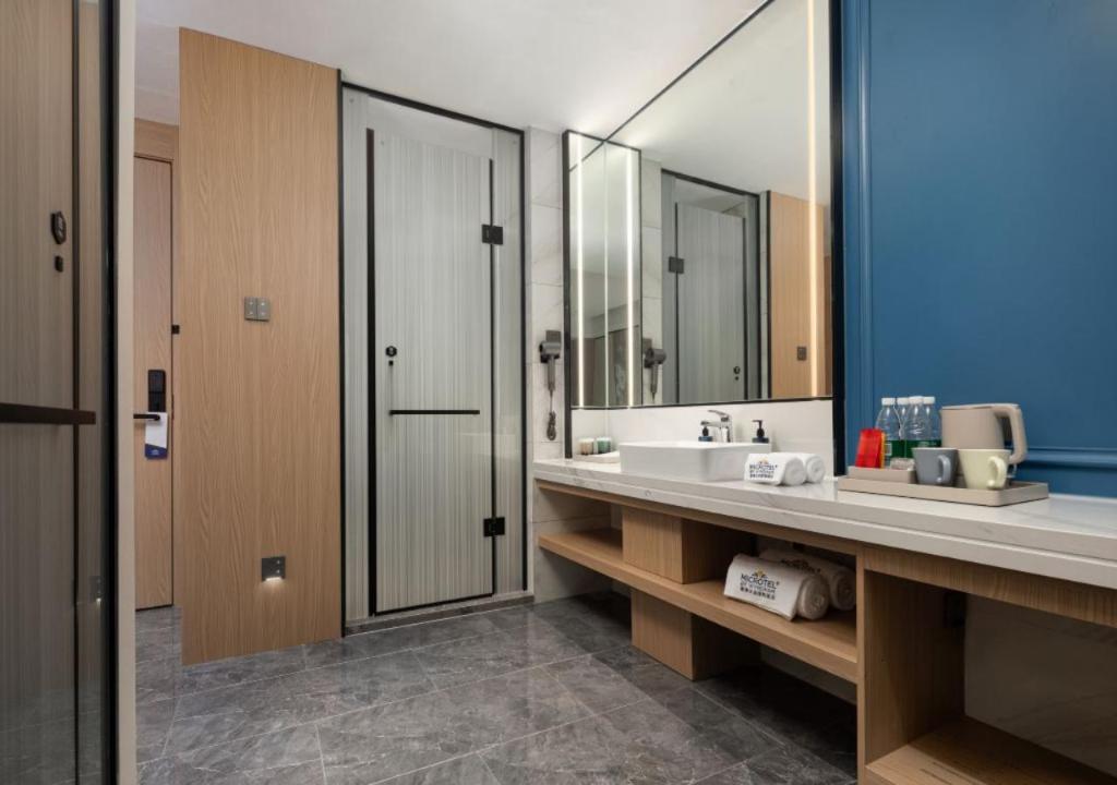 Фото Microtel by Wyndham Qingdao Huangdao