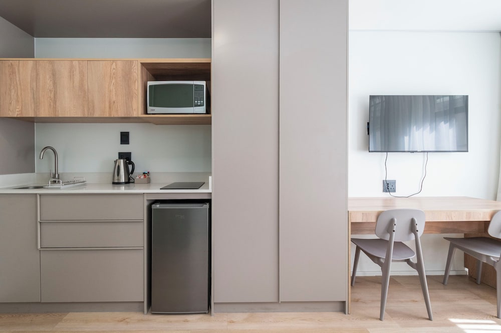 Фото Habitat Aparthotel by Totalstay