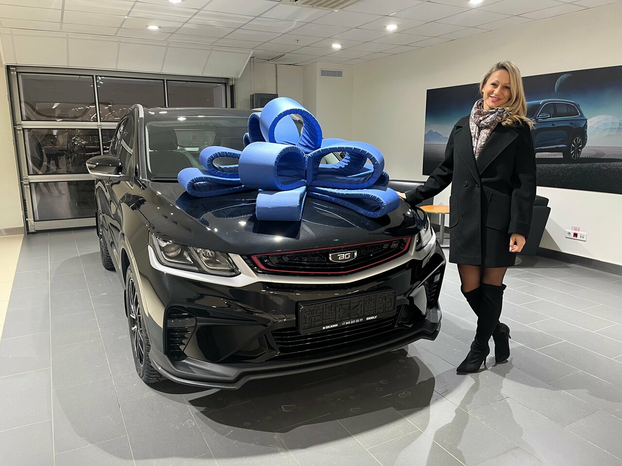 photo Оками Geely