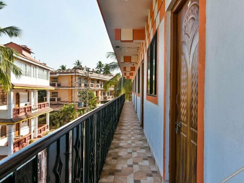 Гостиница Oyo 12199 Porto De Vintage Holiday Homes в Арпоре