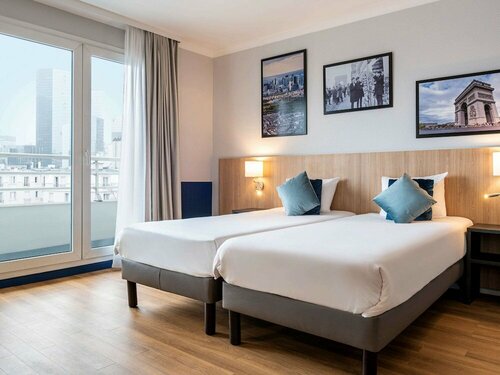 Гостиница Aparthotel Adagio La Défense Kléber в Курбевуа