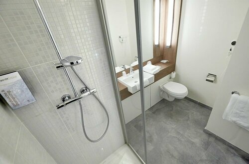 Гостиница Campanile Saint Quentin EN Yvelines в Монтиньи-ле-Бретонё