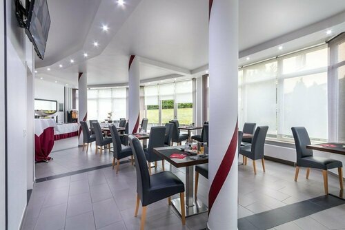 Гостиница Turmhotel Rhein Main в Лангене