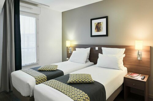 Гостиница Residhome Roissy Village в Сарселе